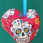 Large colourful white skull on red heart - pic 6
