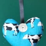 Black and white cows on blue heart - pic 1