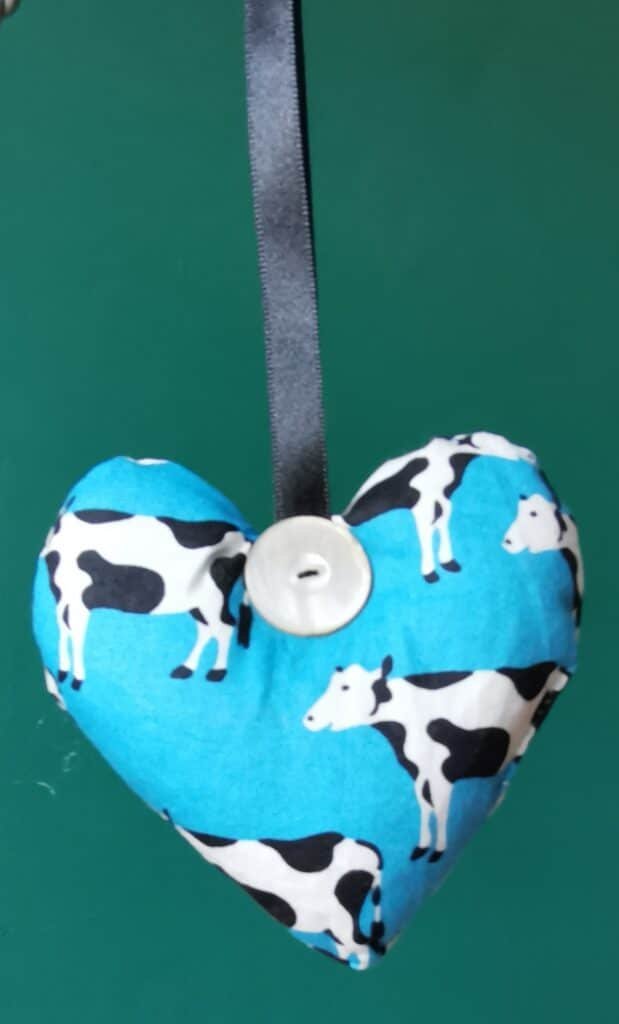 Black and white cows on blue heart - pic 1