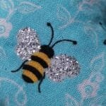 Bees with sparkly wings on blue heart - pic 1