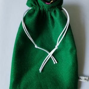 Dark green gift bag with polka dot lining - pic 2